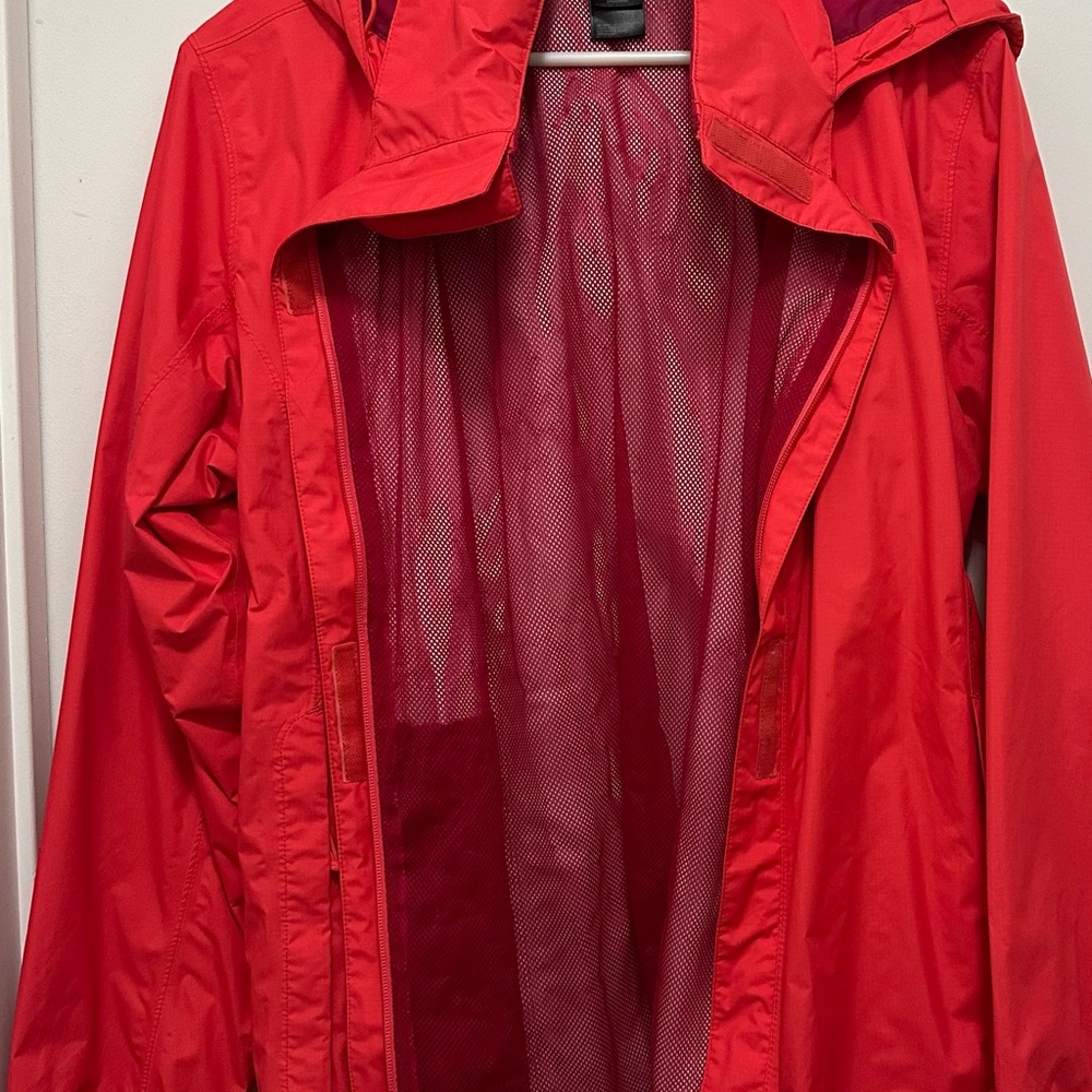 The North Face Women's Vibrant Red/bright pink waterproof jacket.